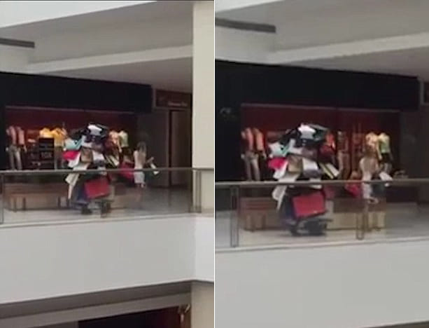 Man Dubbed As The ‘World’s Best Husband’ For Carrying Mountain Of Shopping Bags