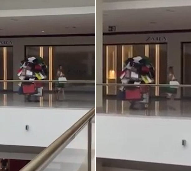 Man Dubbed As The ‘World’s Best Husband’ For Carrying Mountain Of Shopping Bags