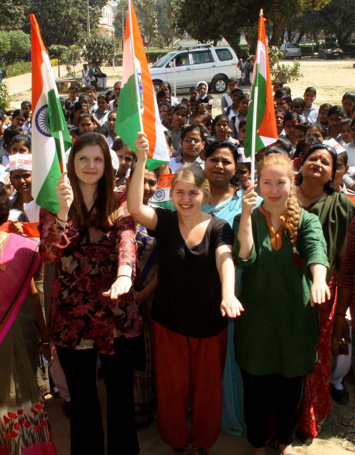 foreigner student hold tiranga for vote campaign in varanasi