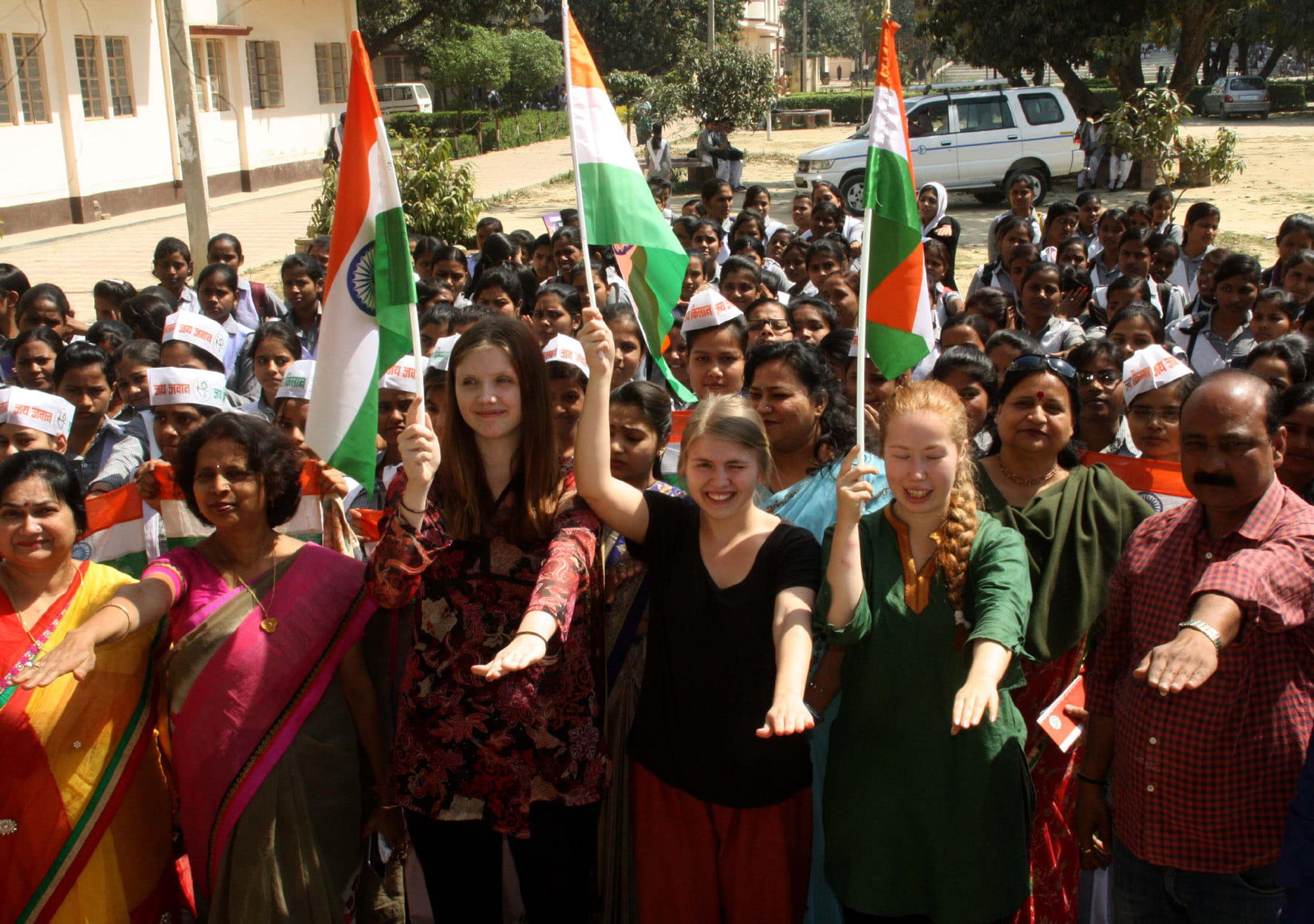 foreigner student hold tiranga for vote campaign in varanasi