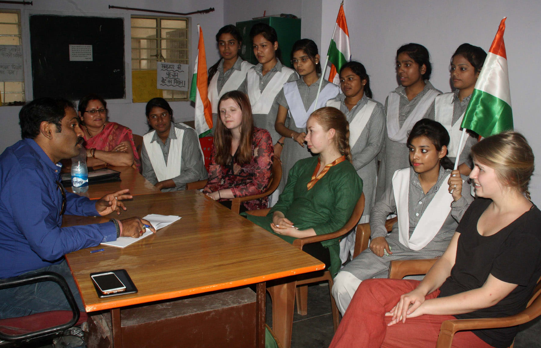 foreigner student hold tiranga for vote campaign in varanasi
