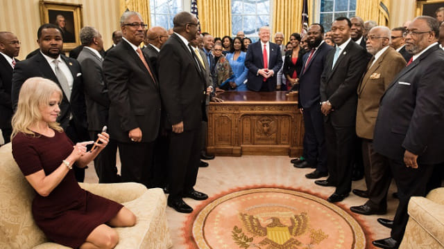 Trump's associate Kellyanne Conway sitting on sofa with heels, photo viral on social media