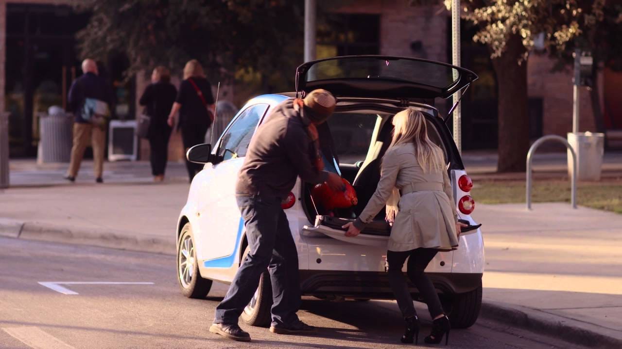 Photo Of Old Woman Sitting In Open Trunk While Son Drives Sparks Outrage
