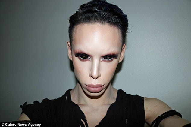 Man spends $50,000 on over 100 procedures to transform into a 'genderless' ALIEN 