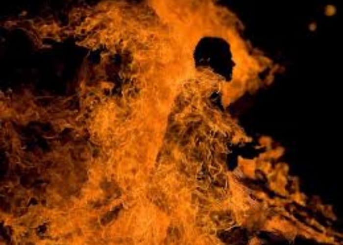 man burnt alive near police station