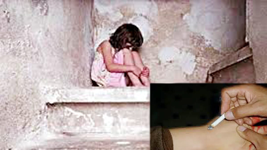 girl child lit from cigarette
