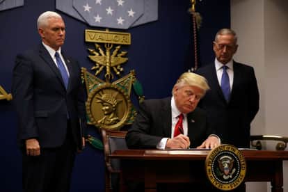 US President Donald Trump Signs New Travel Ban Excluding Iraq