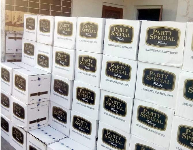 Wooden cabin in trucks making illegal liquor was being smuggled, went caught million worth of wine