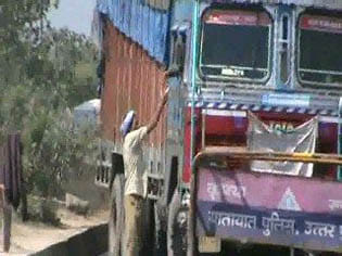 The driver hit the soldier slapped