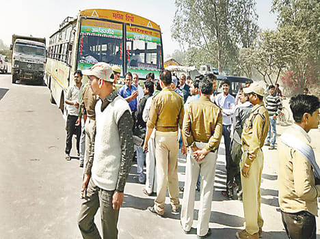 Bus collides with truck, injures six