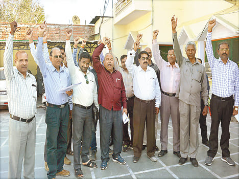 Grameen Bank personnel demonstrated for pension