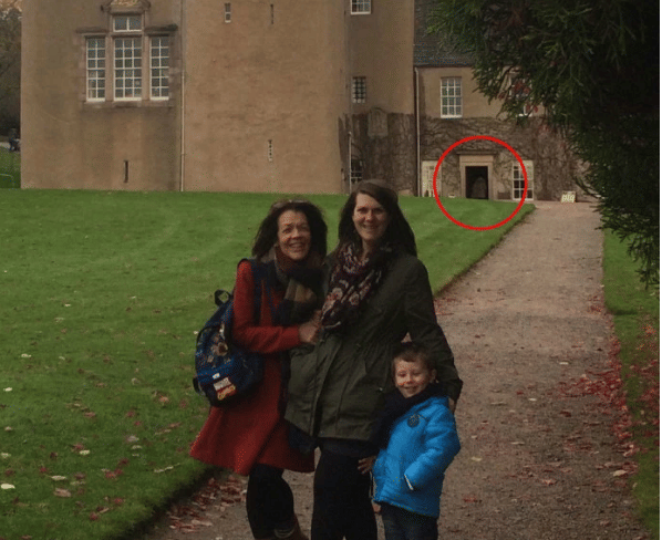 Chilling family snap reveals ghostly figure