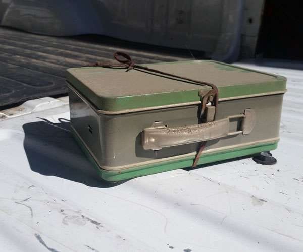 65year old lunch box hidden in the house wall.