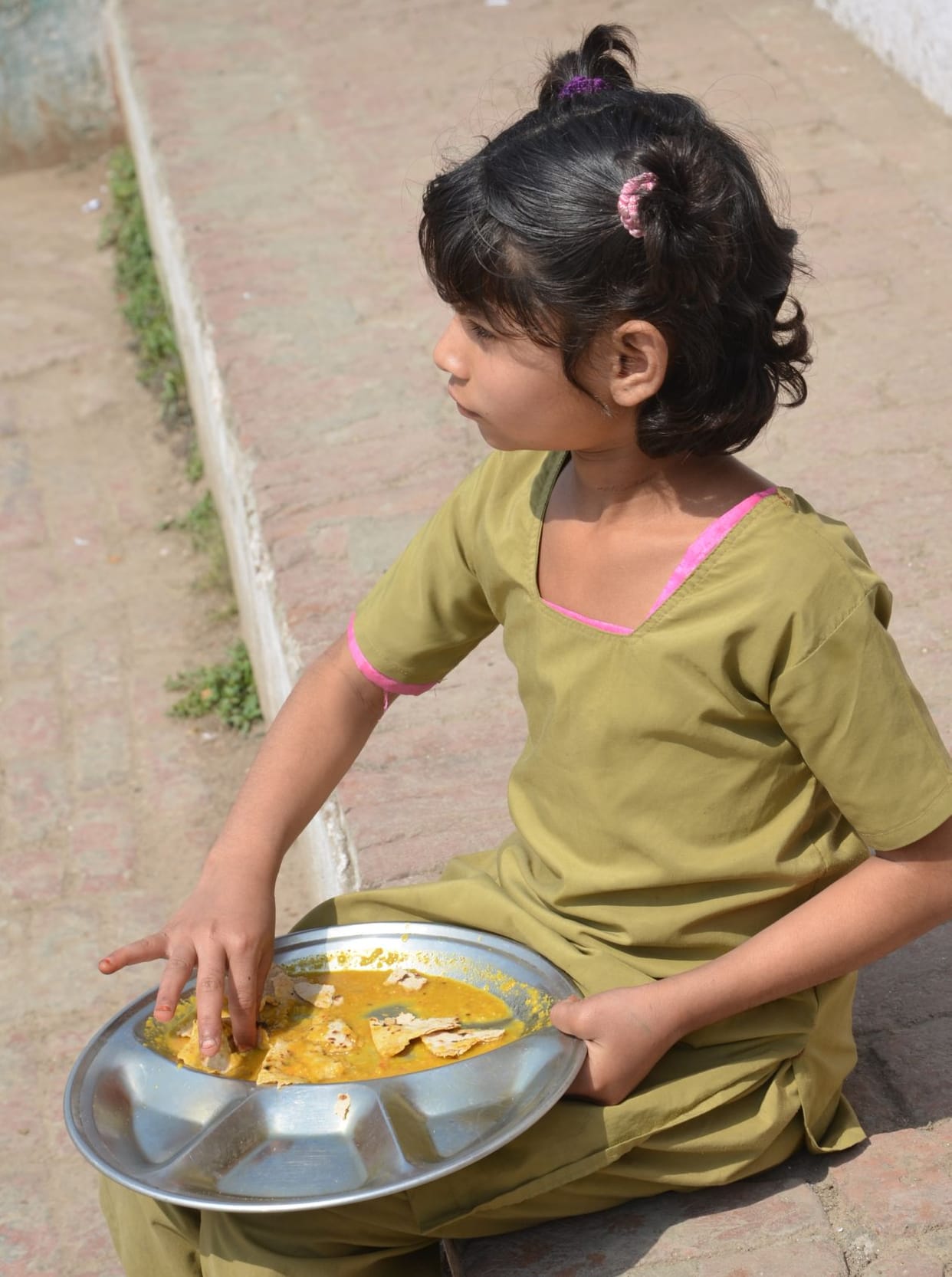 Mid-Day Meal Dried Roti and Lentil Dal.
