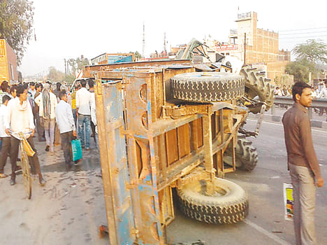 Tractor reflex from truck collision on highway