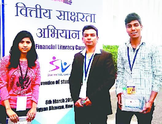 Mukesh and Sarita honored for cashless campaign