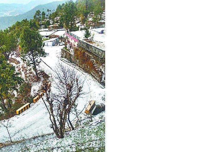 Rain and hail almora