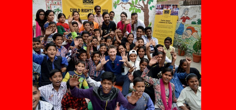 Former Australian cricket captain Michael Clarke meets slum children.