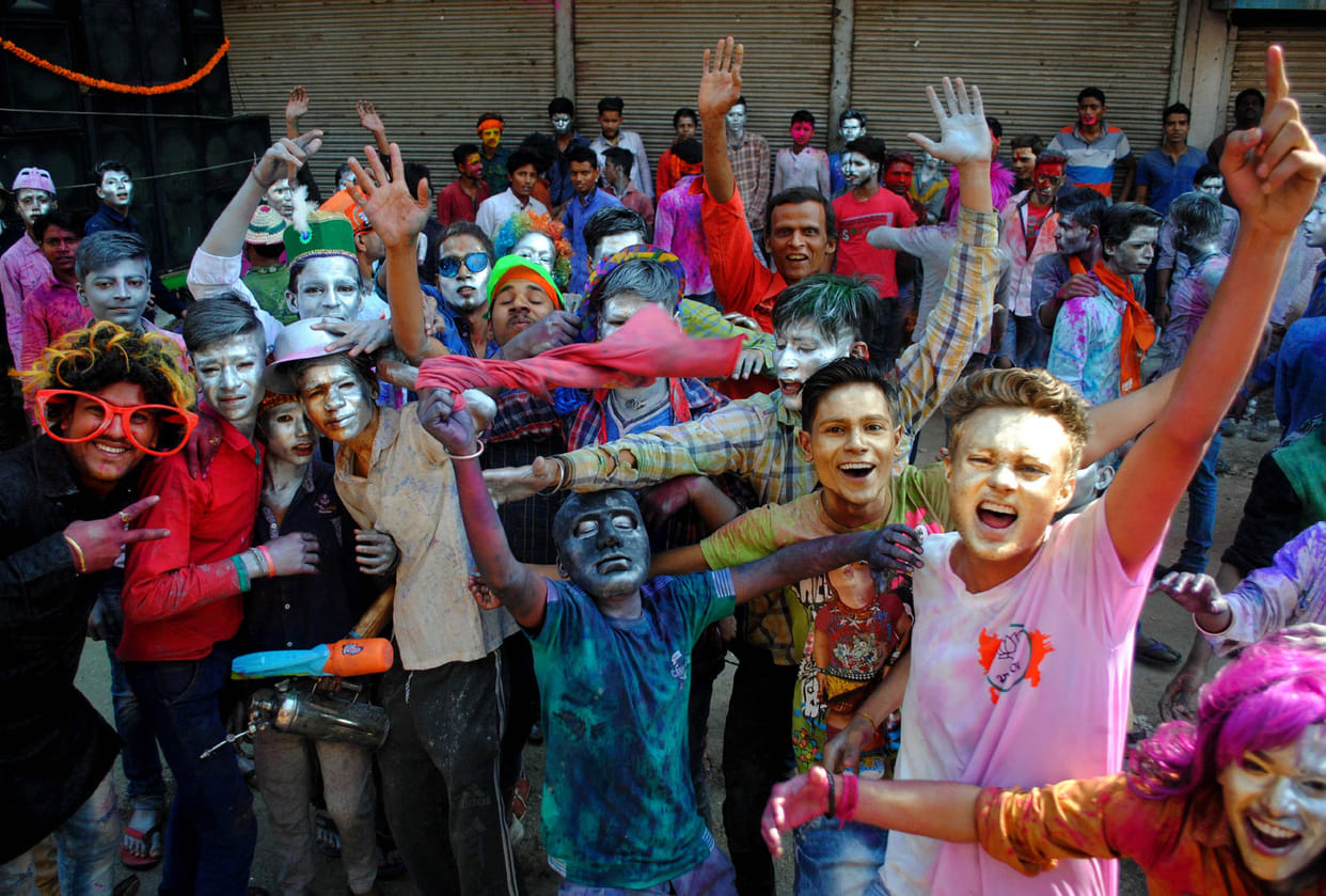 thrown the colours of love and prosperity on the occasion of holi celebration at kashi