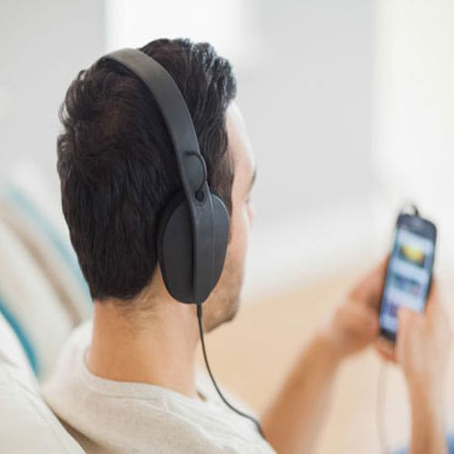 headphone damaged the shape of ears of a man
