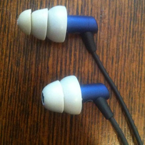 headphone damaged the shape of ears of a man