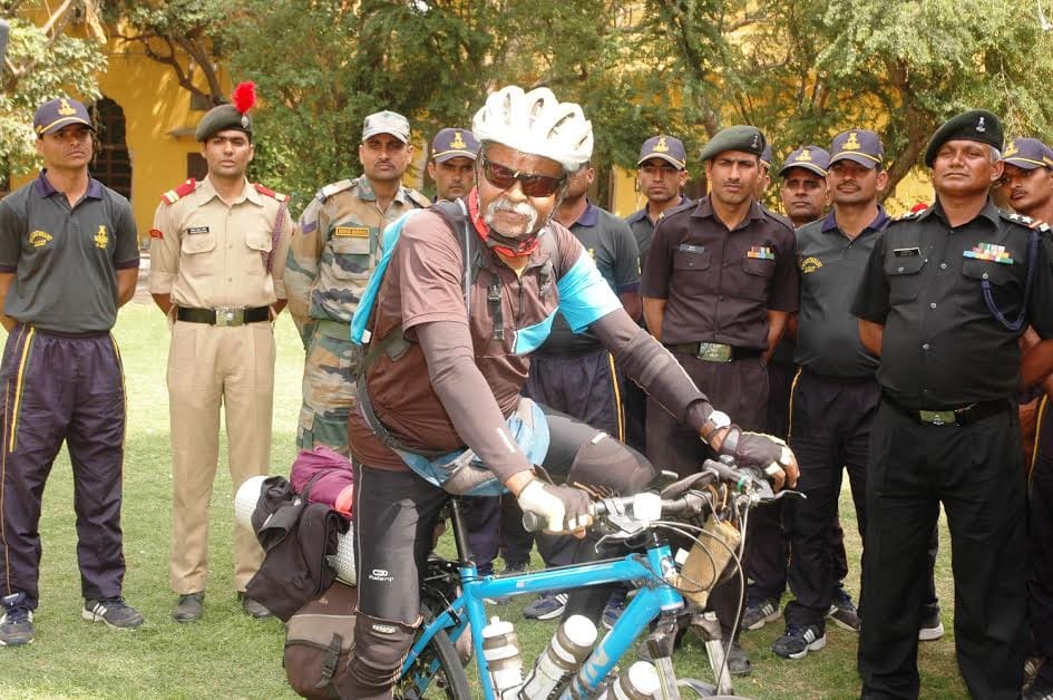 A former military official is on a bicycle trip with this special message