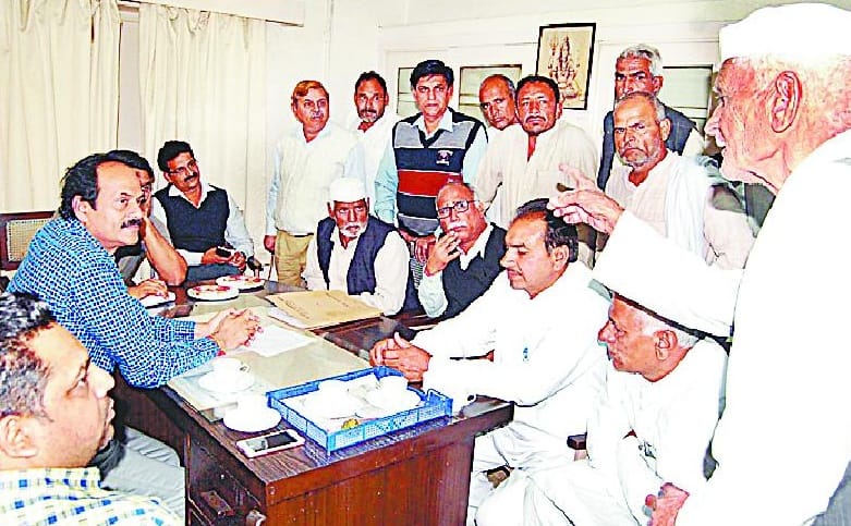 Sued on sugar mill workers