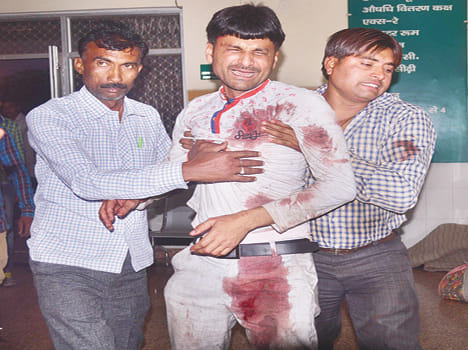 Collision of trucks and tempo in blind turn, Death of two
