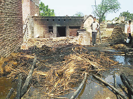 Three houses burnt by fire, two goats died