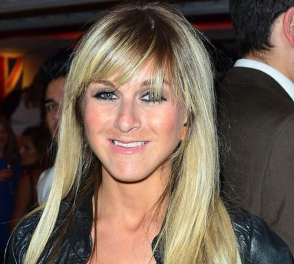 Nikki Grahame embraces her inner vamp as she wears completely see-through lace dress 