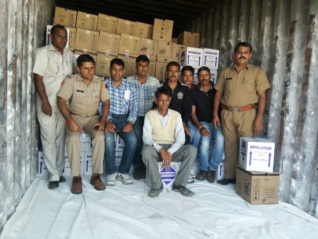 Liquor smuggled by hiding in the containers of the postal parcel, caught liquor of  50 lakhs