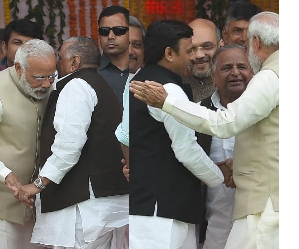 pm modi meets akhilesh and mulayam after swearing-in ceremony