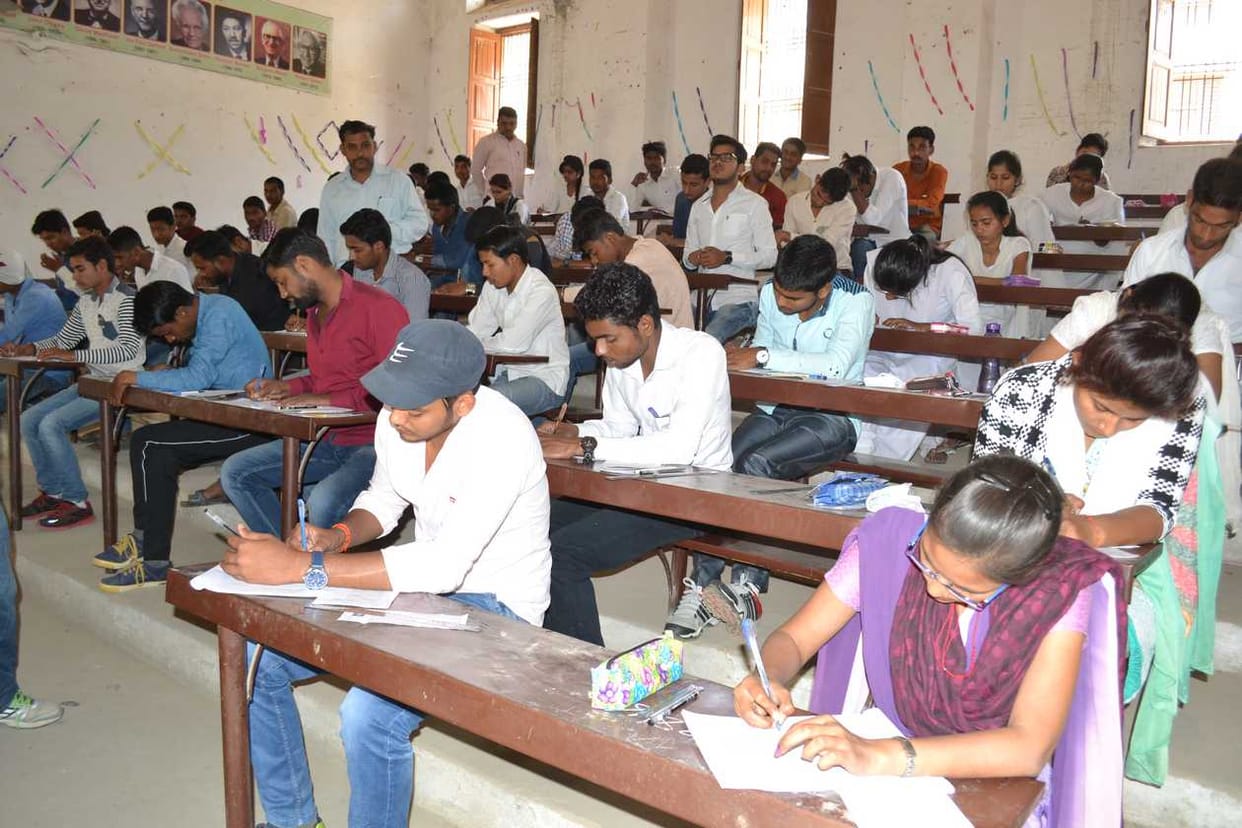 no scholarship to the students scoring less than 50% marks