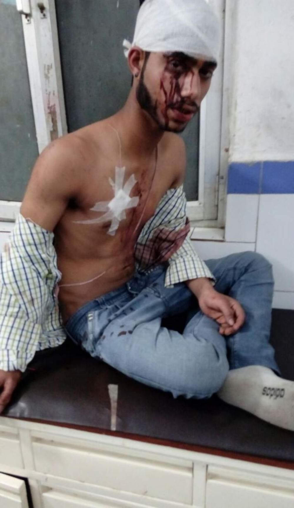 a man attack on a young boy with knife
