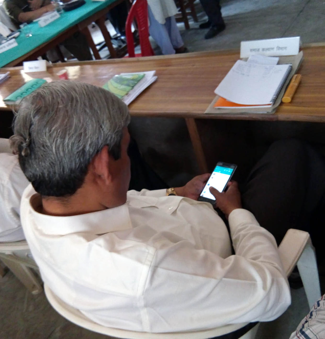 officers were busy in mobile during tehsil diwas