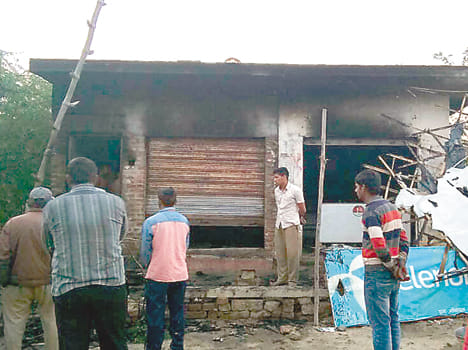 Gas cylinder leaks, two shops ash