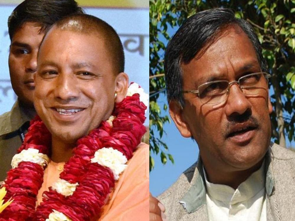 uttarakhand cm afraid due to up cm praised everywhere
