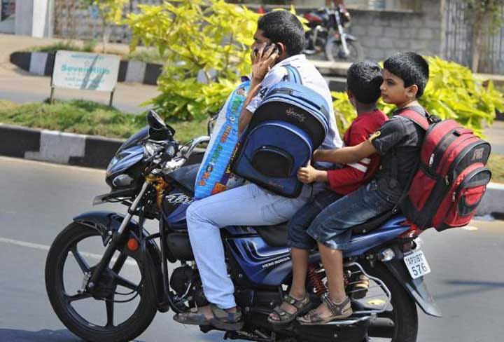 Do not ride your bike with three pillion rider