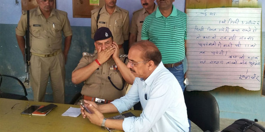 disabled man gives a threat letter to UP Police cops