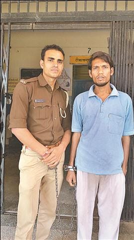 Yogi arrested pornographic poster