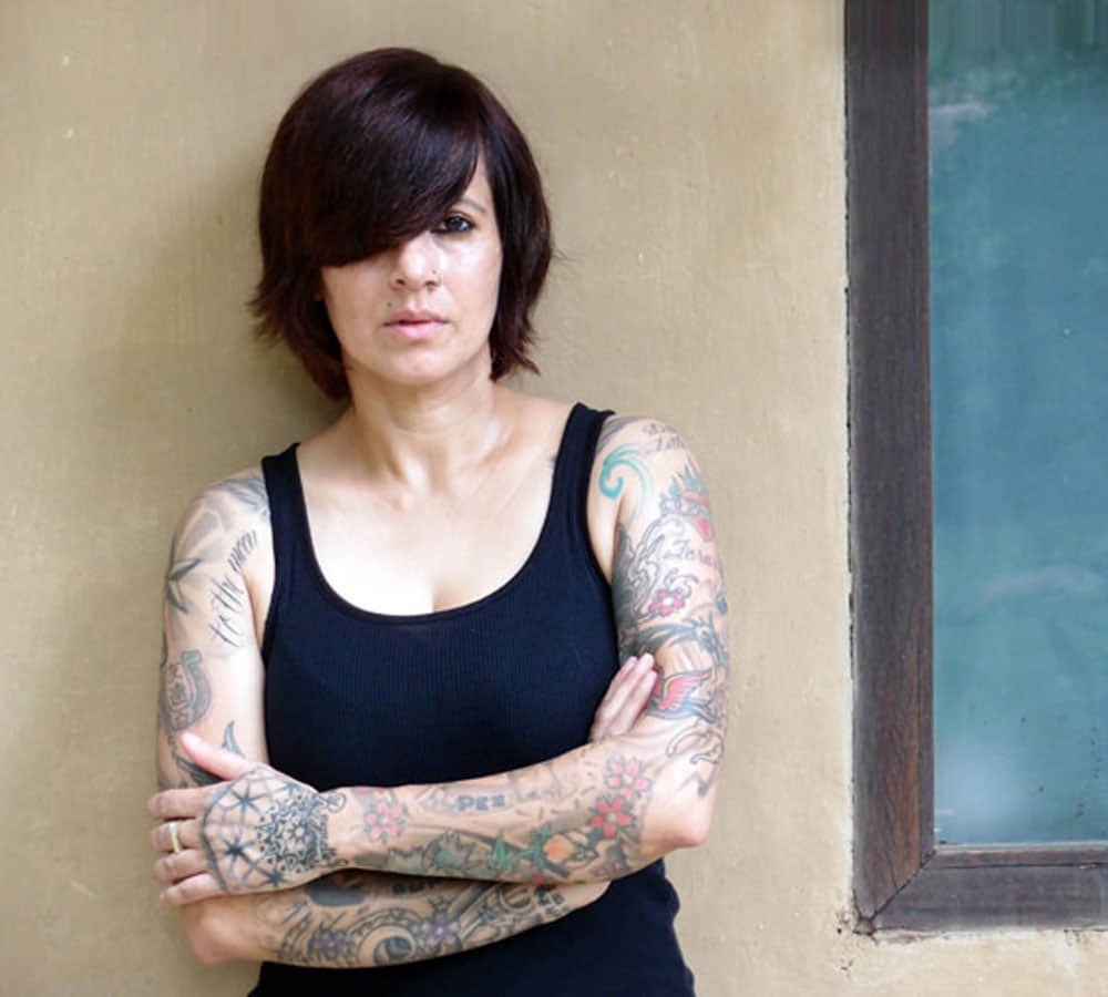 Bigg Boss 6 contestant Sapna Bhavnani goes topless displays her TATTOOS in the BOLD pic