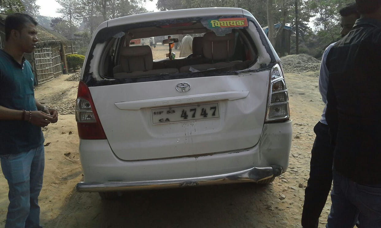 The tractor collided with the driver's car, injured