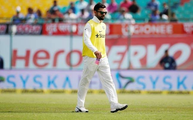 Dharamsala Test: injured Kohli bringing teammates drinks