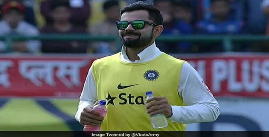 Dharamsala Test: injured Kohli bringing teammates drinks
