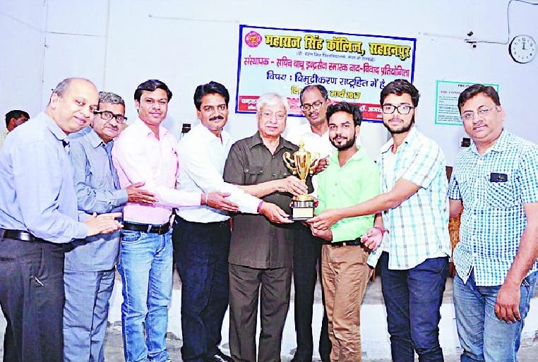 Tanuj win debate