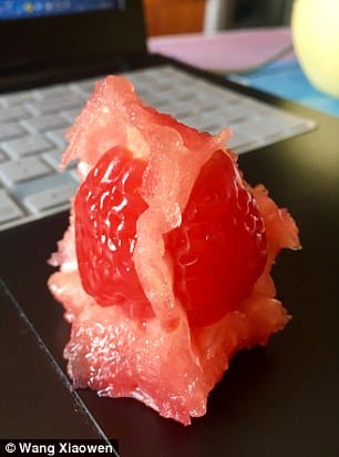 Man finds strawberry inside tomato