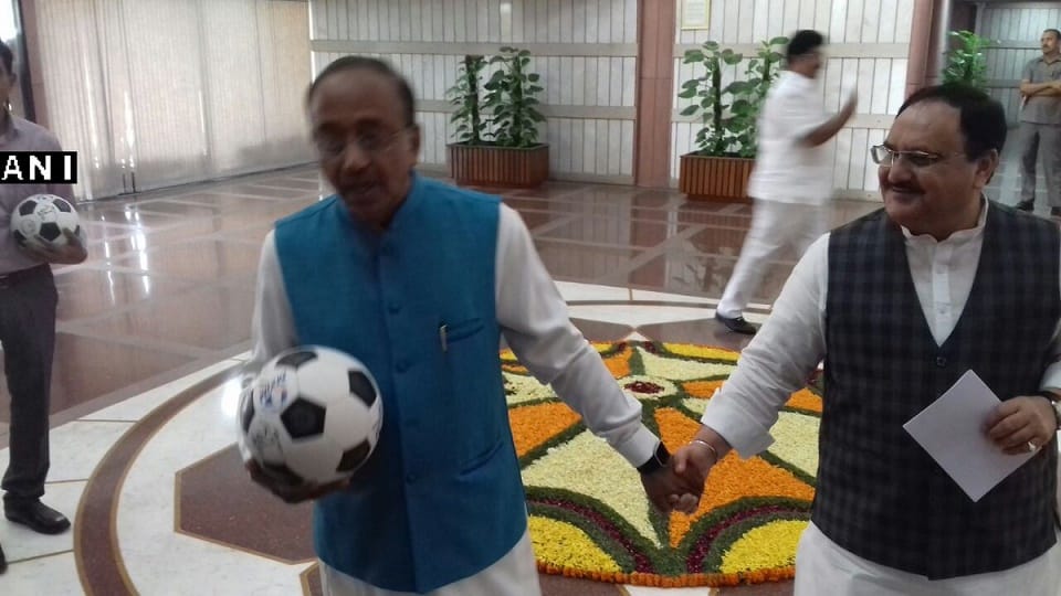 Sports Minister Vijay Goel comes to BJP Parliamentary party meet with a football