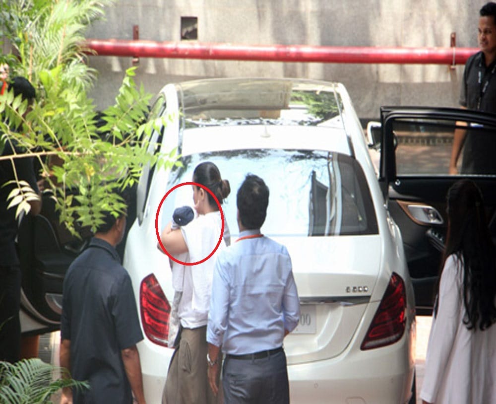 Karan Johar twins clicked outside hospital as he takes them home
