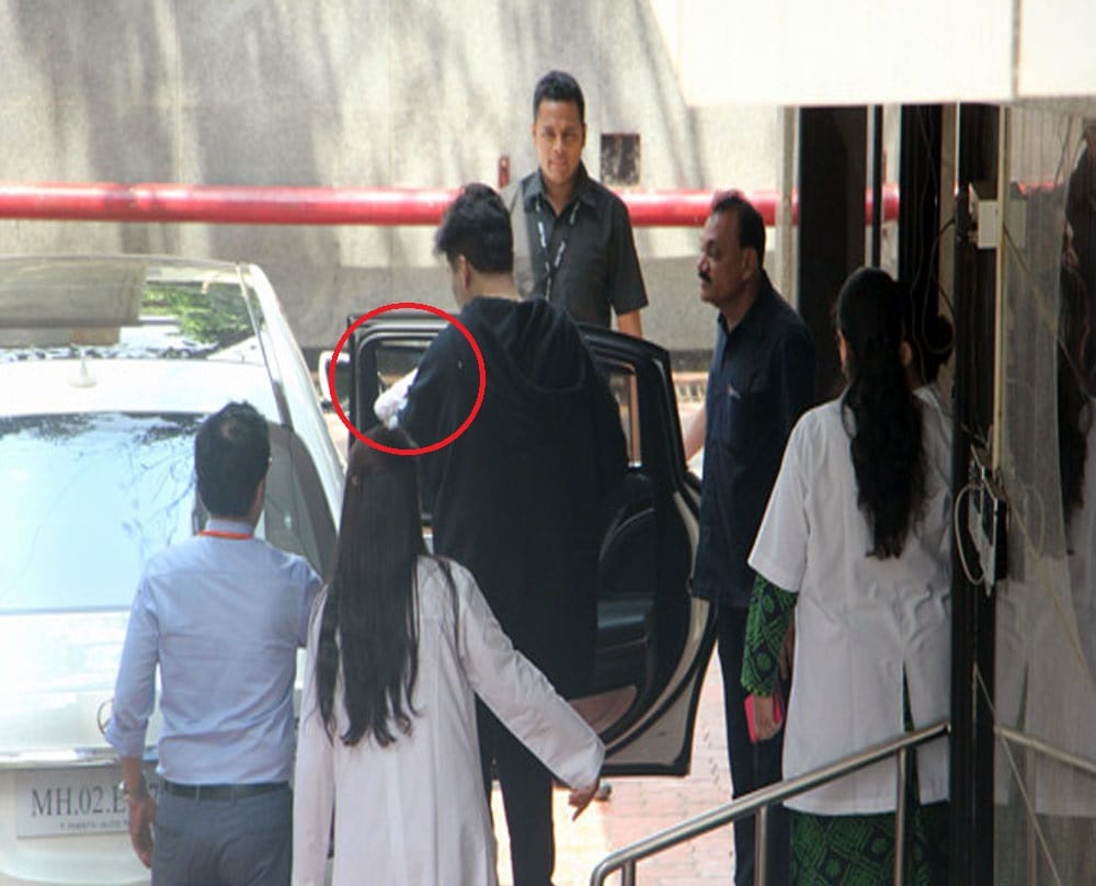 Karan Johar twins clicked outside hospital as he takes them home