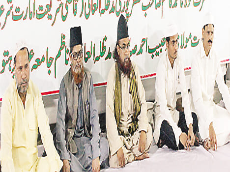 Deobandi, Barelvi and Shia Ulma, seen on a stage